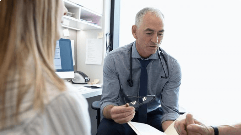 Doctor speaking with patients Doctor speaking with patients