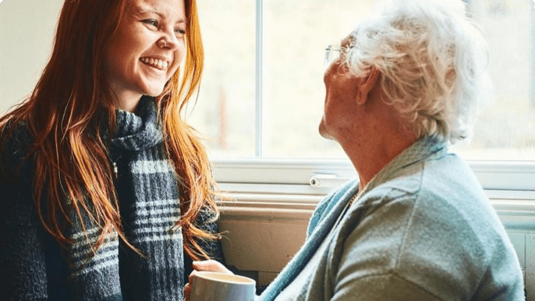 Grandmother_and_granddaughter_smiling_together_by_a_window-three-card  Grandmother_and_granddaughter_smiling_together_by_a_window-three-card