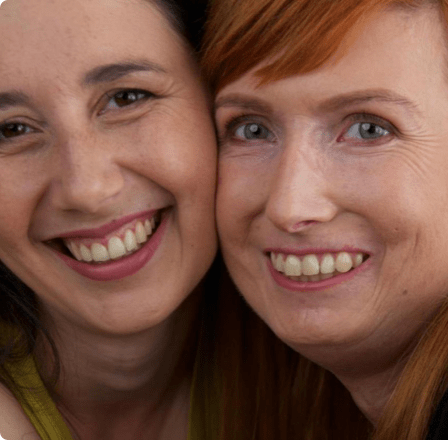 Two ladies taking a friendly selfie Two ladies taking a friendly selfie
